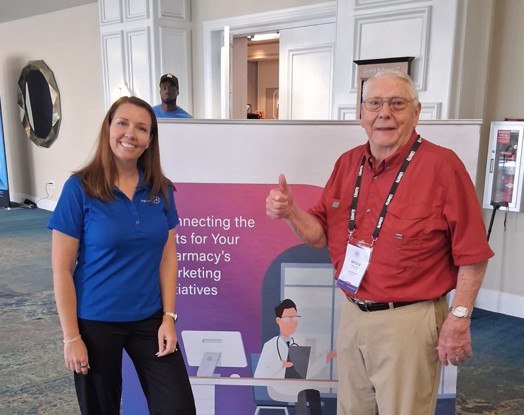 Nicolette Mathey with Bruce Kneeland at the AtriumX conference